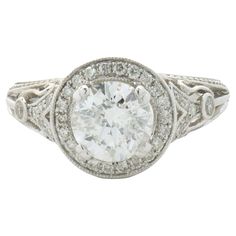 an antique style diamond ring set in white gold