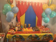 a birthday party with balloons and decorations