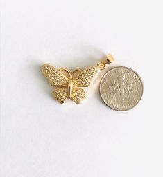 18K GOLD FILLED BUTTERFLY WITH WHITE CZ. PENDANT SIZE : 28 x 22 MM 18K GOLD FILLED DIJE DE MARIPOSA CON CZ BLANCO. TAMAÑO DEL DIJE : 28 x 22 MM Yellow Gold Butterfly Shaped Jewelry With Cubic Zirconia, Yellow Gold Cubic Zirconia Butterfly Jewelry, Gold Plated Butterfly Charm Jewelry, Gold Plated Butterfly Necklace With Charm, Gold-plated Jewelry With Butterfly Charm, Gold Butterfly Pendant Necklace In Cubic Zirconia, Gold Cubic Zirconia Butterfly Pendant Necklace, Gold Cubic Zirconia Butterfly Necklace, Gold Butterfly Jewelry