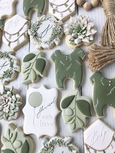 some decorated cookies are laying on a table