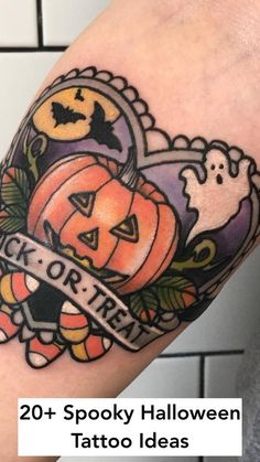 a halloween themed tattoo on the arm