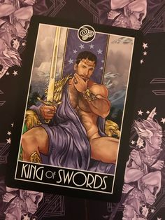 a tarot card with the title king of swords