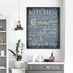 a kitchen wall hanging above a stove top oven