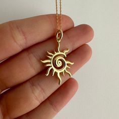 Spiral Sun Necklace, Little Sun Charm, 925 Sterling Silver Minimal Glowing Sun Pendant, Hippie Jewelry, Celestial Necklace, Gift for Her Little Sun Charm is going to brighten your day while completing your outfit ☀️ Product Details, - Carefully produced with High Quality 925k Sterling Silver - 14k Gold Plated - Height of the pendant: 2.2 cm (0.83 inches) - Chain Length is optional; 45 cm or 55 cm, and also you can order the pendant with no chain - Unique and delicate design ✈️✈️✈️ EXPRESS & FREE SHIPPING ✈️✈️✈️ - All items come in nicely packaged beautiful jewelry boxes ready to gift - All of our jewelry are hypoallergenic. For long term use, it should be protected from chemical products such as detergents, bleach, perfume. BEST GIFT FOR THE LOVELY ONES ♥️ Feel free to contact us for any q Sunburst Necklace Gold, Sun Themed Accessories, Evil Eye Gifts, Sun Necklace Silver, Sun Necklaces, Sun Choker, Sun Accessories, Hippy Jewelry, Spiral Sun