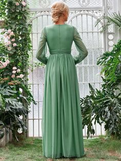 Product Code: FSWD1721 Embellishment: Knit Fabric: 95% Polyester,5%Spandex Back Style: Zipper Up Fully Lined: Yes Built-in Bra: No Available Color: Green Stretch: Moderate Fits true to size Imported Model Information: Height: 5' 2" Bust: 33.5'' Waist: 24“ Hips: 35.5” wearing US size Small Long Sleeve Ruched Dresses For Banquet, Ruched Long Sleeve Dresses For Banquet, Long Sleeve Pleated Maxi Dress For Banquet, Green Non-stretch Long Sleeve Maxi Dress, Stretch Long Sleeve Dress With Ruched Bodice, Fitted Empire Waist Maxi Dress For Fall, Green Empire Waist Evening Dresses, Elegant Green Non-stretch Maxi Dress, Green Long Sleeve Dress For Banquet