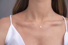 ✦ Gold Triangle Necklace ✦ Gold Triangle Necklace / Dainty Diamond Geometric Necklace / Triangle Geometric Minimalist Necklace / Delicate Triangle Pave Necklace ✧ DESCRIPTION & DETAILS Dainty Diamond Bar Necklace, Delicate Minimalist Diamond Bar Necklace, 14k White, Yellow, Rose Gold Tiny Diamond Bar Necklace You will love this dainty solid gold diamond bar necklace. This necklace can be a great gift for a family member, girlfriend, wife, or for yourself. ✔ Made to Order ✔ Gold Kt: 9k-14K ✔ Diamond Bar Necklace, Pave Necklace, Gold Triangle, Triangle Necklace, Gold Diamond Necklace, Diamond Bar, Tiny Diamond, Necklace Minimalist, Geometric Necklace