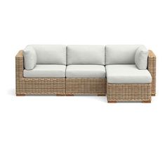 an outdoor sectional sofa with cushions