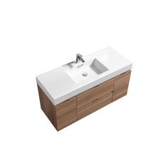 a white sink sitting on top of a wooden cabinet