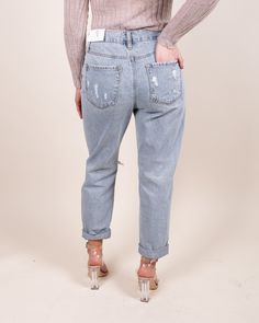 Step aside boyfriend jeans, our Daya High Rise Distressed Girlfriend Denim are here! These light wash high rise denim have no stretch with a cuffed hemline. Finished with a front fly + zipper button closure. These will be your new favorite go to denim since this pair is simply versatile and can be paired with anything in your closet! High Rise Fit True Light Wash Wash Straight Leg No Stretch Distressed Fabrication Fading & Whiskering Cuffed Hem– 3.5” difference in Length when Uncuffed Classic 4 High Waist Distressed Light Wash Cropped Jeans, High Waist Light Wash Distressed Cropped Jeans, High Waist Distressed Cropped Jeans In Light Wash, Ripped Light Wash Cropped Jeans For Fall, Spring Mom Fit Cropped Jeans With Frayed Hem, Spring Cropped Mom Jeans With Frayed Hem, Trendy Ripped Light Wash Cropped Jeans, Trendy Light Wash Cropped Jeans With Frayed Hem, Light Wash Distressed Cropped Denim Jeans