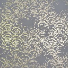 an abstract pattern with white and gold colors on a gray background that looks like something out of space