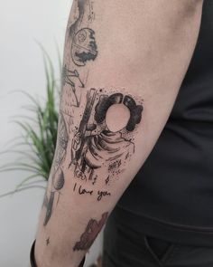 a person with a tattoo on their arm