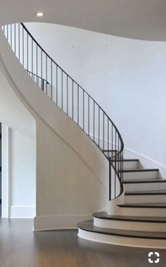 a spiral staircase in a modern home