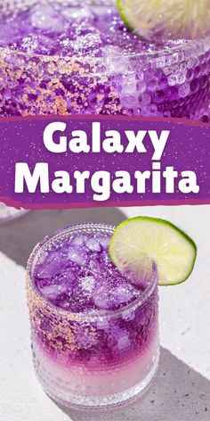 two glasses filled with purple liquid and lime slices on top of each glass, next to the