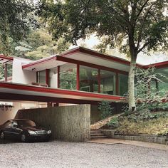 a car is parked in front of a house