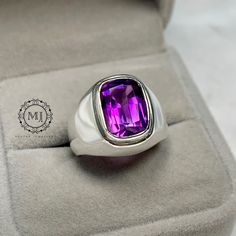 Ring Details - Natural Amethyst 5.00ct Approximate - Natural Amethyst Cushion Cut - Handmade Ring - Gross Weight 15.00 to 20.00 grams - Sterling Silver 925 - Hallmarked - Dimensions and Weight Depends on Variations in Sizes. - Available in all Sizes ( Please make sure about your ring sizes) - DM for Customizations NOTE: - Our Products are Made to Order According to Customer's Expectations So It May Take Some Time. Because We Work on Our Products Very Professionally and Passionately We Will Be Very Glad To Have Your Patience, But Always Assure Us On Time Delivery, Which Almost Takes 3 to 5 Working Days To Dispatch. - Secondly, All Natural Gemstones are a Little bit Different in color and Shades but still, you get in love with The Gems, and We Also Update Our customers before starting Their Purple Amethyst Hallmarked Signet Ring, Classic Amethyst Signet Ring As Gift, Classic Amethyst Signet Ring For Gift, Formal Amethyst Rings With Vs Clarity, Classic Purple Gemstone Signet Ring, Formal Amethyst Ring With Vs Clarity, Purple Sterling Silver Gemstones With Accent Stones, Fine Jewelry Amethyst Ring With Rectangular Stone, Purple Gemstone Signet Ring For Anniversary