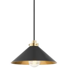 a black and gold pendant light hanging from the ceiling