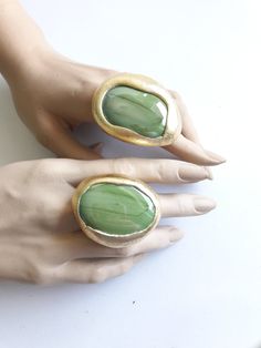 Big Green Ring, Statement Ring, Large Ring, Oval Gold Ring, Big, Modernist, Rough Contemporary, Artisan Ring, Huge Ring, Fashion, Jewelry, Unique Ring, Handmade Jewelry, Unique Jewelry, ADJUSTABLE FOR BIG SIZES KEEP IT AWAY FROM hair spray, nail polish remover, and other chemicals. -Measure approx.: MODEL A: 5.2 cm x 3.8 cm = 2" x 1.5" MODEL B: 4.6 cm x 3.7 cm = 1.8" x 1.5" Unique Handmade Oval Rings, Handmade Oval Nature-inspired Ring, Gold Ring Big, Oval Gold Ring, Big Statement Rings, Huge Rings, Green Ring, Green Rings, Artisan Rings