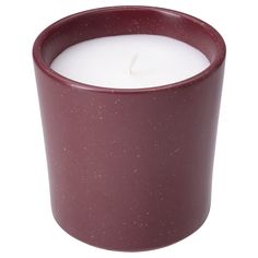 a candle that is sitting in front of a white background