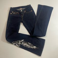 Rare True Religion Flare Leg Dark Blue Jeans With Sequin Embellished Eagle On Right Pant Leg. These Have Stretch For Comfort And Yet Look Amazing. Washed Once Never Worn Low Rise. A Spectacular Statement Pair Of Jeans. Size 26 Waist Approx: Inseam Approx: Rise Approx: Black And Silver Sequin Eagle Design On Right Pant Leg 5 Pockets Flare Leg 99% Cotton 1% Elastine True Religion, Blue Jeans, Flare Leg, Low Rise, Stretch Jean Style Bundle, Eagle Design, Dark Blue Jeans, True Religion Jeans, Silver Sequin, Jeans Flare, Black And Silver, True Religion, Stretch Jeans