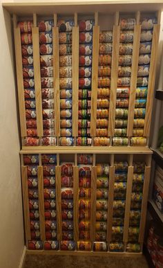 an organized pantry filled with canned food