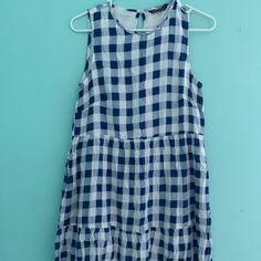 White And Navy Gingham Dress Blue Plaid Summer Midi Dress, Gingham Sleeveless Midi Dress For Day Out, Blue Plaid Midi Dress For Summer, Sleeveless Gingham Midi Dress For Day Out, Sleeveless Summer Plaid Dress For Brunch, Casual Spring Dress With Grid Pattern, Sleeveless Plaid Dress For Summer Brunch, Casual Grid Pattern Dress For Spring, Casual Sleeveless Gingham Midi Dress