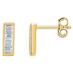 Put a little sparkle in your style with these small vertical bar earrings made from 14k yellow gold and genuine baguette diamonds. They measure approximately 3mm (1/8 inch) in width by 9mm (3/8 inch) in length. The 2.2mm natural diamonds are H-I in color, I1 in clarity and the total diamond weight for the pair is 1/3 carat. Baguette Studs, Baguette Earring, Diamond Bar Necklace, Diamond Baguette, Vertical Bar, Amethyst And Diamond Ring, Bow Jewelry, Diamond Bar, Gold Diamond Earrings