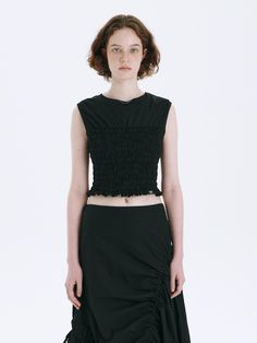 This is a trendy and casual top by MARGESHERWOOD that is made out of high quality and sturdy material. With distinctive mood of the design and comfortable wear, you can style it for your casual daily outfit.- Unique smocking embroidery detail- Slim fit and cropped length- Logo label on the hem Trendy Sleeveless Stretch Smocked Top, Stretch Cotton Sleeveless Smocked Top, Stretch Sleeveless Cotton Smocked Top, Sleeveless Stretch Cotton Smocked Top, Casual Black Ruched Tank Top, Black Sleeveless Ruched Top, Black Ruched Sleeveless Top, Sleeveless Tops With Smocked Back, Trendy Cotton Tops With Smocked Back