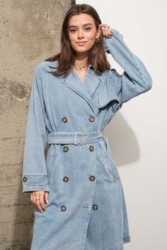 A luxe approach to a classic trench with a double breasted front, pointed collar, wrap around belt and cuffs. Crafted from 100% Cotton for a classic denim look and feel, this chic trench will be your new go-to. With a wide range of styling options, wear with leather leggings or throw over a ribbed knit dress. Double Breasted Oversized Belted 100% Cotton Model is wearing size small Childrens Shop, Flowy Romper, Denim Trench Coat, Ribbed Knit Dress, Mesh Bodysuit, Top Graphic Tees, La Fashion, Denim Flares, Sweatshirt Dress