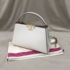 New Leather Tory Burch Eleanor Spazzolato Satchel Bag Portable Shoulder Bag . Very Stylish Bag, Good Value For Money. The Approx: 321222cm Color: Off White This Handbag Has An Adjustable Shoulder Strap. Wide Range Of Uses Brand New, Unused, With Dust Bag, Label. Welcome To Share And Offer . Thank You Shop With Me. Any Questions Pls Dont' Hesitate And Let Me Know.Tks. Designer Tan Bag With Detachable Handle, Designer Tan Bags With Detachable Handle, Designer Tan Top Handle Bag, Luxury Tan Bags With Double Handle, Luxury Tan Bags With Top Carry Handle, Luxury Tan Bag With Top Carry Handle, Luxury Tan Crossbody Bags, Luxury Tan Handheld Bag, Luxury Tan Top Handle Bag