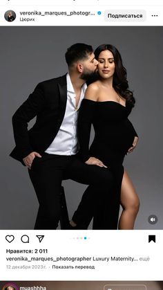 a man and woman posing for a photo in front of a gray background with the caption