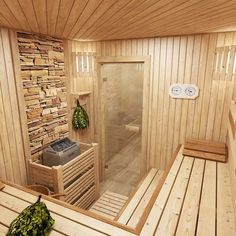 a wooden sauna with two benches and a shower in the center, surrounded by wood planks