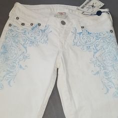 Hard To Find True Religion Jean's In White With Beautiful Light Blue Artwork Down Both Sides. Style Is Called Cathedral. Size 29 Waist Inseam 31 Skinny. Normally $246.00...Never Been Worn, Nwt! I Love Reasonable Offers And Bundles!! Check Out My Closet For More Must Haves! Light Blue Artwork, Blue Artwork, True Religion Jeans, Jeans Color, Beautiful Lights, True Religion, Colored Jeans, Must Haves, Blue White