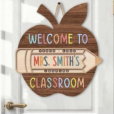 a wooden sign that says welcome to mrs smith's classroom