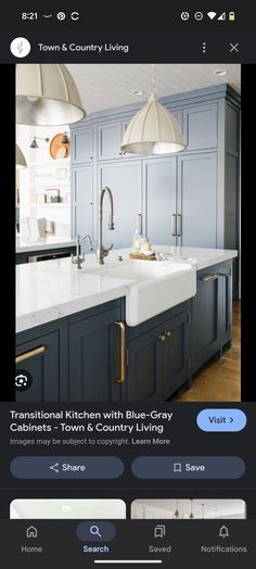 a kitchen with blue cabinets and an island in the middle is featured on instagram