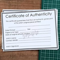 certificate of authenticity on wood table with green cutting mat