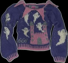 the sweater is knitted and has animals on it