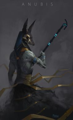 anubis holding a staff in his hands