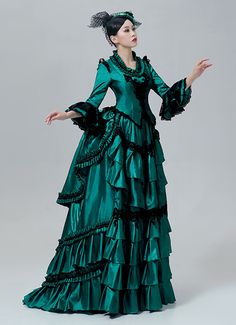 18th Century Victorian Bustle Dress Rococo Marie Antoinette Costume  Color:Green  Material: This dress made of High Quality Satin, soft,smooth and comfortable to wear  Sleeve Length:  Long Sleeve  Dresses Length:Floor Length  Neckline:  Square Collar  Decoration: Ruffles + Lace  Package Includes:  Dress + Hat    The length of skirt about 45 inches (114 cm) long from waist to hem regardless of size. This dress is pictured with a 6-hoop skirt Petticoat underneath to achieve the look. Petticoa Ball Gown Green, Masquerade Party Dresses, Bustle Dresses, Marie Antoinette Dresses, 18th Century Dresses, Gothic Victorian Dresses, Victorian Bustle, Gown Green, Antoinette Dress