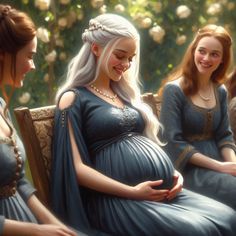 three pregnant women are sitting on a bench and one is holding her belly while the other looks at her phone