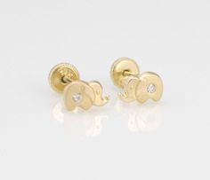 This Cute and Precious dainty Elephant Stud Post Earrings are made from high quality Solid 14k Gold They are a perfect gift for anyone of any age and excellent for everyday wear. Item Specifications: Model # BE-410S7 Metal Type: Solid 14K Gold Metal Stamp: 14K Shape Baby Elephant Fastening: Screw Back Style: Stud Post Size: SMALL Size: 4 x 7mm ( 3/16 x 5/16 inch ) Earrings Puff Pad size: 1 3/8 inches x 1 1/8inch (35mm x 28mm) The screw backs are really good for kids and adults because its hard t 14k Yellow Gold Earrings With Screw Back, 14k Yellow Gold Screw Back Earrings, Hypoallergenic Yellow Gold Diamond Earrings As Gift, Hypoallergenic 14k Yellow Gold Diamond Earrings, 14k Gold Screw Back Earrings For Wedding, 14k Gold Screw Back Jewelry Gift, Gold Screw Back Diamond Earrings For Gift, Gold Diamond Screw Back Earrings For Gift, Gift Gold Diamond Earrings With Screw Back