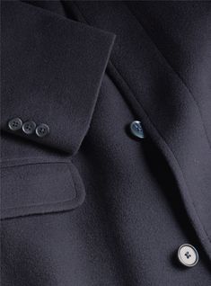 Formal Long Sport Coat With Buttons, Semi-formal Outerwear With Notch Lapel And Covered Buttons, Classic Peacoat With Buttons, Single Breasted Long Sport Coat For Tailoring, Classic Winter Pea Coat With Covered Buttons, Classic Office Outerwear With Covered Buttons, Formal Long Coat With Covered Buttons, Classic Long Coat Blazer With Hidden Button Closure, Classic Outerwear With Notch Lapel And Covered Buttons