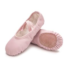 pair of pink ballet shoes on white background