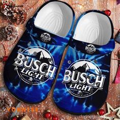 Introducing the Busch Light Unisex Classic Clogs For Fans Unisex Gifts 2024! Step up your footwear game with these stylish and comfortable clogs that are perfect for any Busch beer enthusiast. Made from high-quality materials, these classic clogs offer a perfect blend of style and durability. Featuring the iconic Busch Light logo, these unisex clogs are a must-have for any fan. Whether you're attending a tailgate party, hanging out with friends, or simply running errands, these clogs will mak... Crocs Shoes For Men, Cool Crocs, Blue Crocs, Busch Light, Light Shoes, Crocs Clog, Clog Shoes