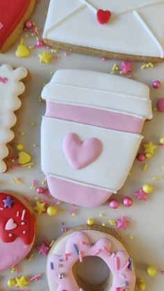 decorated cookies and pastries on a table