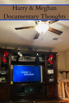 a large entertainment center with a flat screen tv on it and the words harry & megahan documentary thoughts above it