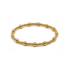 Beautiful Gold-Filled stretch pattern bracelet This classic bracelet has 3mm and 5mm gold filled beads Bracelets are 6.75" The Ava looks great alone or in a stack It makes a perfect gift All bracelets are handmade in NY with love Please review Materials & Care page