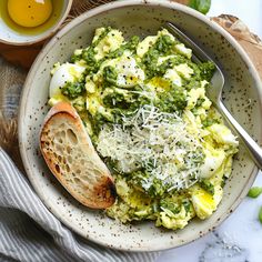 a white bowl filled with broccoli and cheese