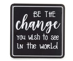 a black and white sign that says be the change you wish to see in the world