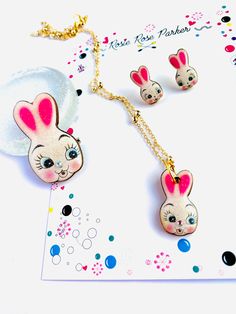 Hop into Easter with this playful bunny necklace by Rosie Rose Parker. With its cute and kitschy charm, celebrate the holiday in style. Perfect for adding a touch of quirky fun to your outfit. Easter Bunny Cartoon, Easter Gift For Adults, Easter Bunny Earrings, Bunny Necklace, Easter Earrings, Easter Jewelry, Rabbit Gifts, Bunny Earrings, Easter Gifts For Kids