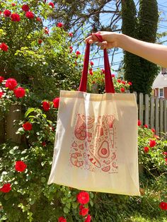 "Grocery Buddy Tote Bag | cute canvas red illustrated food groceries purse for farmer's market trip | lubremerdesign The Grocery Buddy Tote Bag! Perfect for school and/or office work, a trip to the farmer's market, running errands and anything else planned for your day! - dimensions: 15.75\"l x 15.25\"w - material: 4.75 oz. 100% cotton - machine washable!" Eco-friendly Red Canvas Bag For Daily Use, Eco-friendly Red Reusable Bag, Eco-friendly Red Canvas Bag As Gift, Eco-friendly Red Cotton Canvas Bag, Tote Bag Business, Farmers Market Tote Bag, Food Groceries, Colorful Tote Bags, Bag Illustration